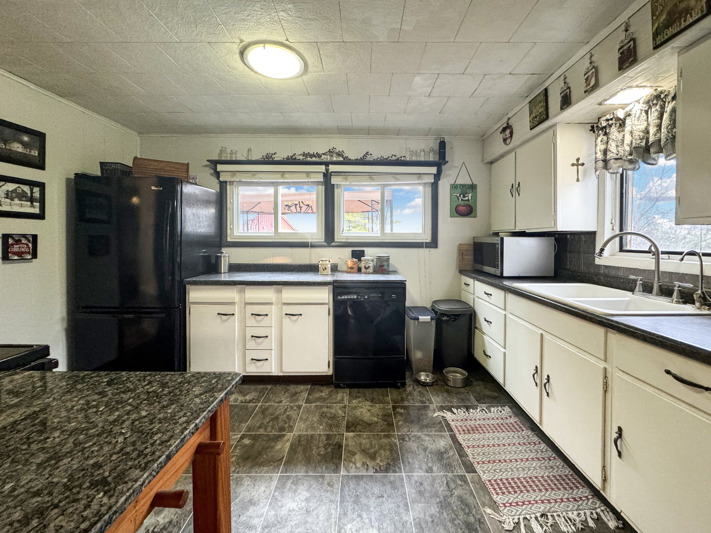 2289 North AYP Road Freeport, IL 61032 - Photo 14 of 52 a kitchen with a sink stove and refrigerator