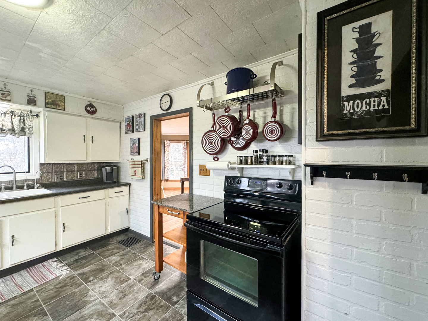 2289 North AYP Road Freeport, IL 61032 - Photo 15 of 52 a kitchen with stainless steel appliances granite countertop a stove and cabinets