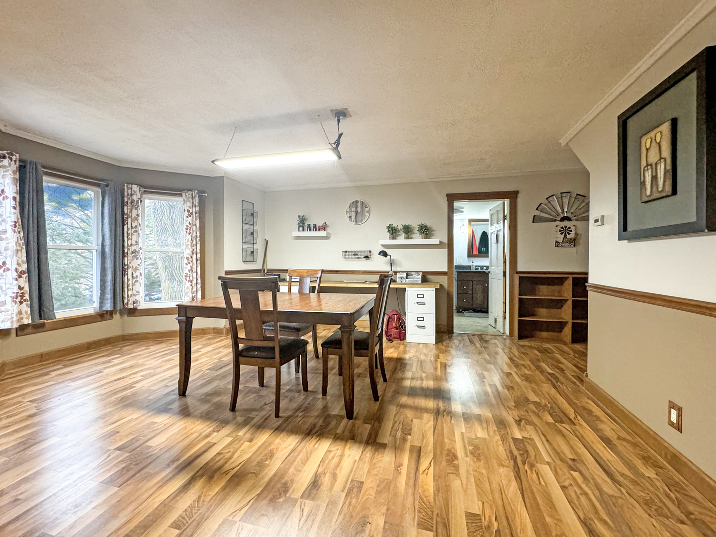 2289 North AYP Road Freeport, IL 61032 - Photo 19 of 52 a view of a dining room with furniture and wooden floor