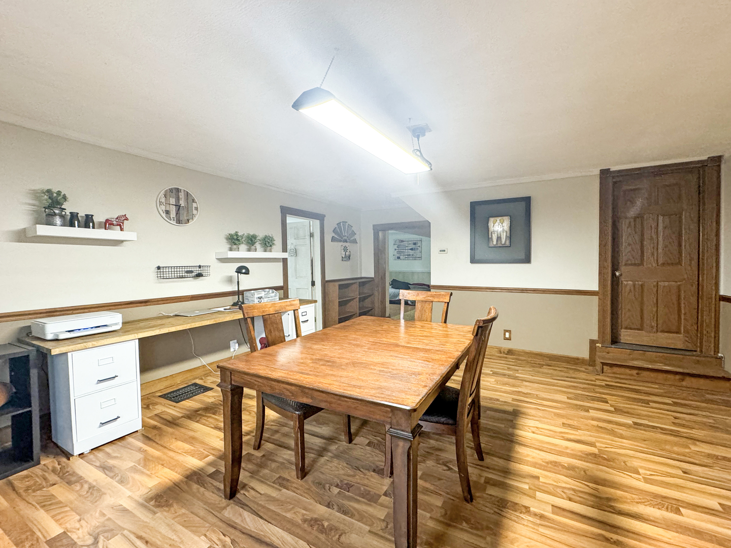2289 North AYP Road Freeport, IL 61032 - Photo 20 of 52 a kitchen with granite countertop a stove a sink a dining table and chairs