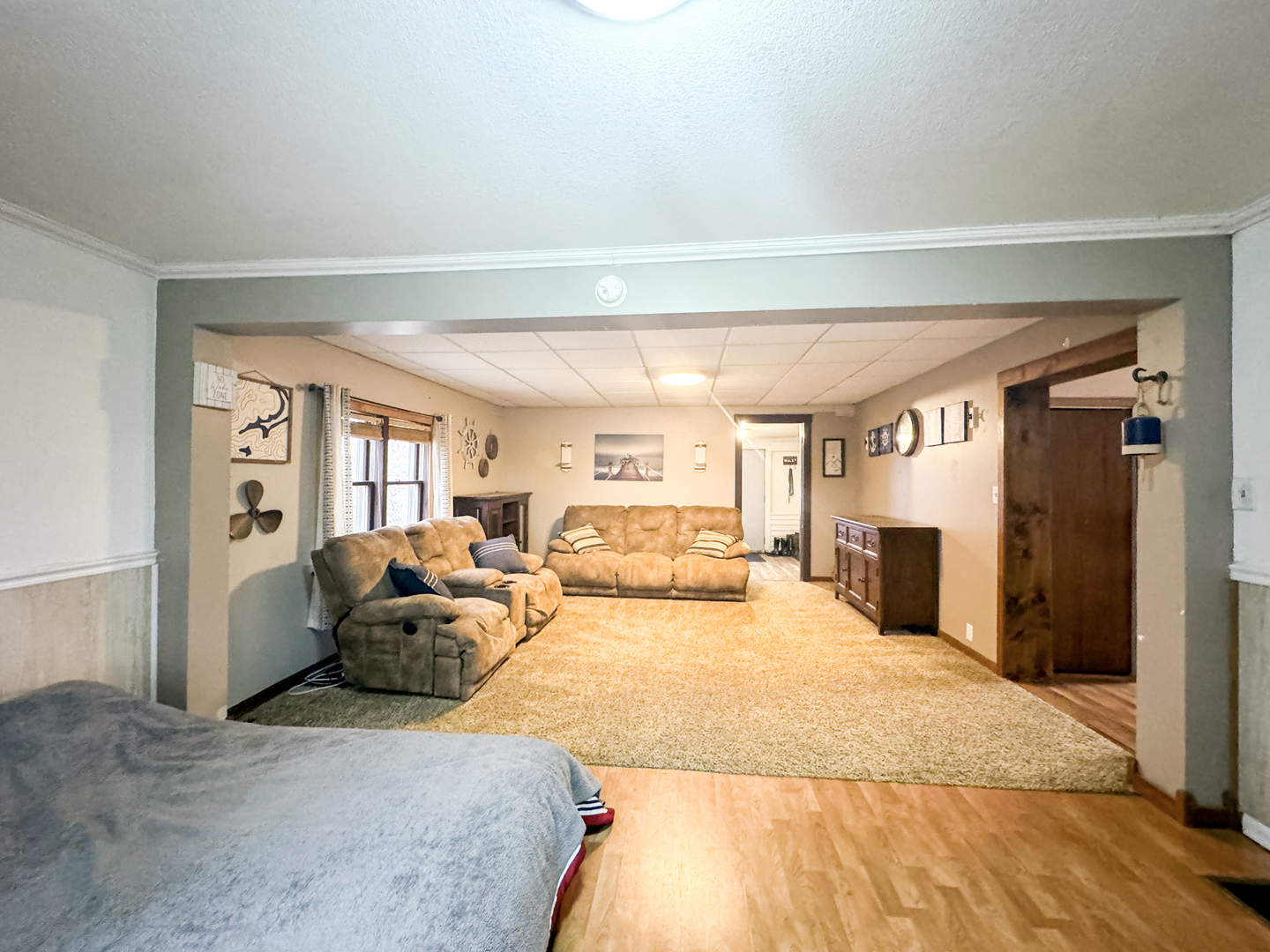 2289 North AYP Road Freeport, IL 61032 - Photo 26 of 52 a spacious bedroom with a large bed and a couch