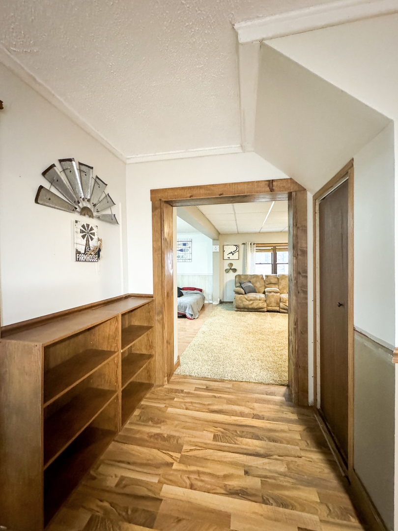 2289 North AYP Road Freeport, IL 61032 - Photo 32 of 52 a view of a room with wooden floor and a window