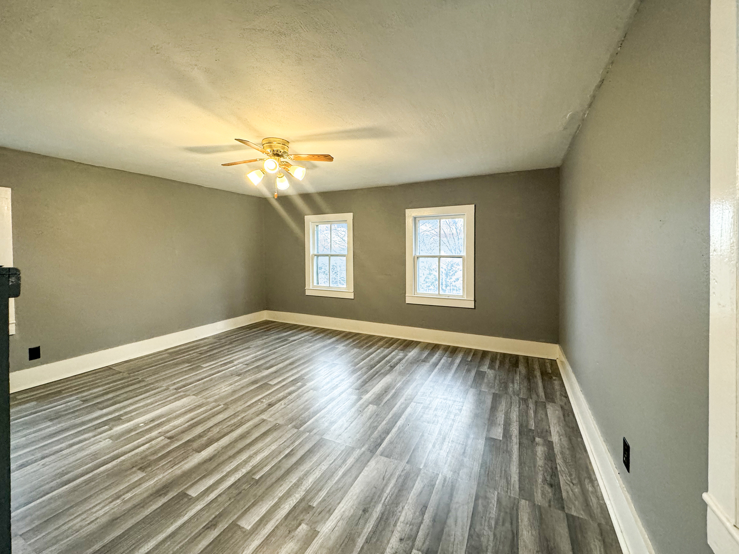 2289 North AYP Road Freeport, IL 61032 - Photo 33 of 52 wooden floor in an empty room with a window