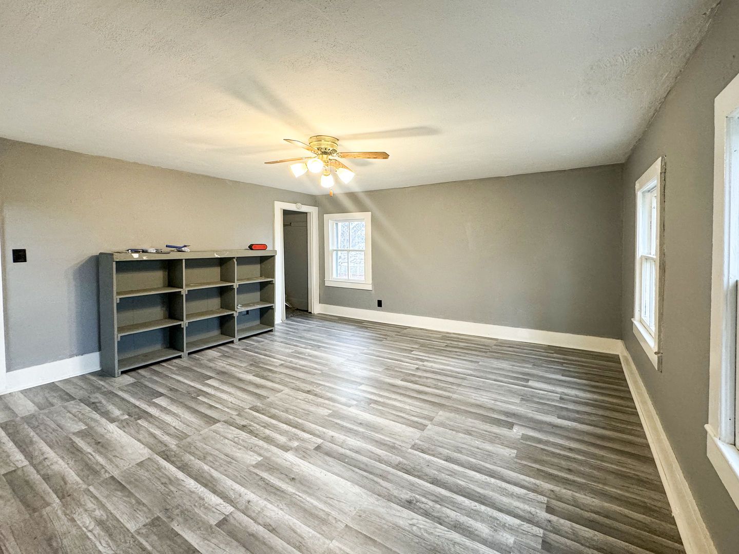 2289 North AYP Road Freeport, IL 61032 - Photo 34 of 52 a view of empty room with wooden floor and fan