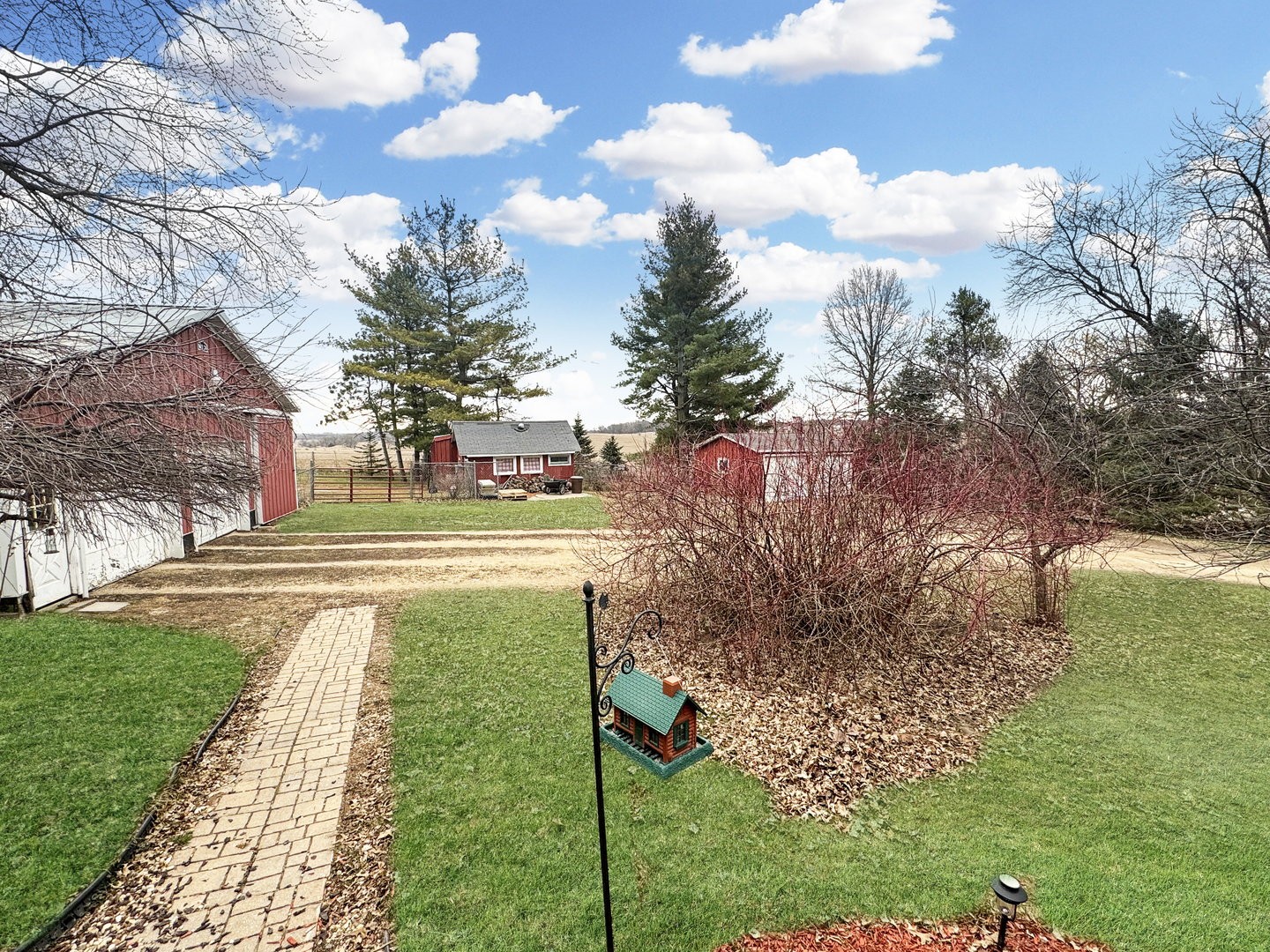 2289 North AYP Road Freeport, IL 61032 - Photo 43 of 52 a view of a house with a yard