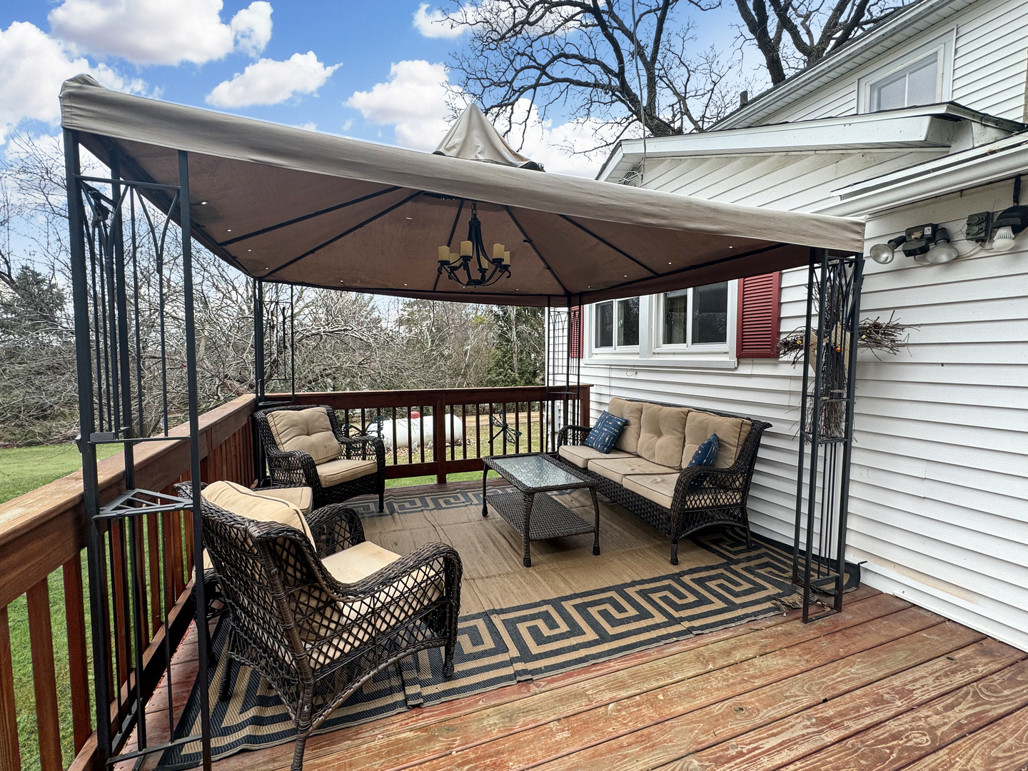 2289 North AYP Road Freeport, IL 61032 - Photo 44 of 52 a view of sitting area with furniture and wooden deck