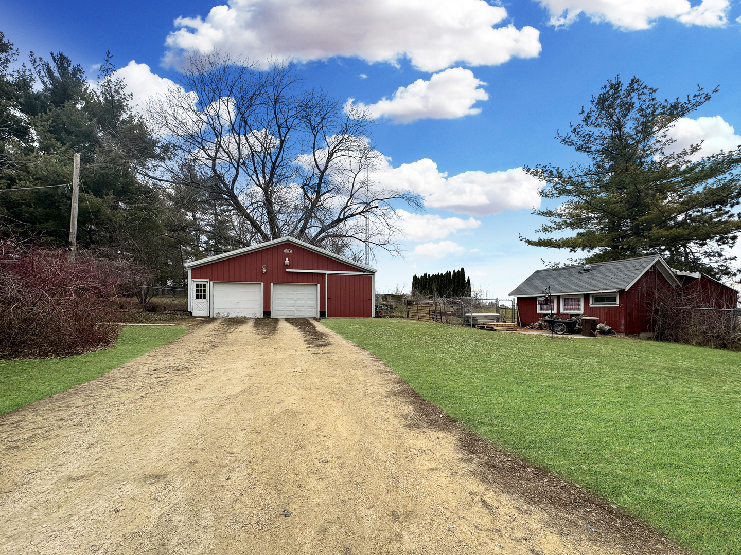 2289 North AYP Road Freeport, IL 61032 - Photo 51 of 52 a view of a big house with a big yard and large trees