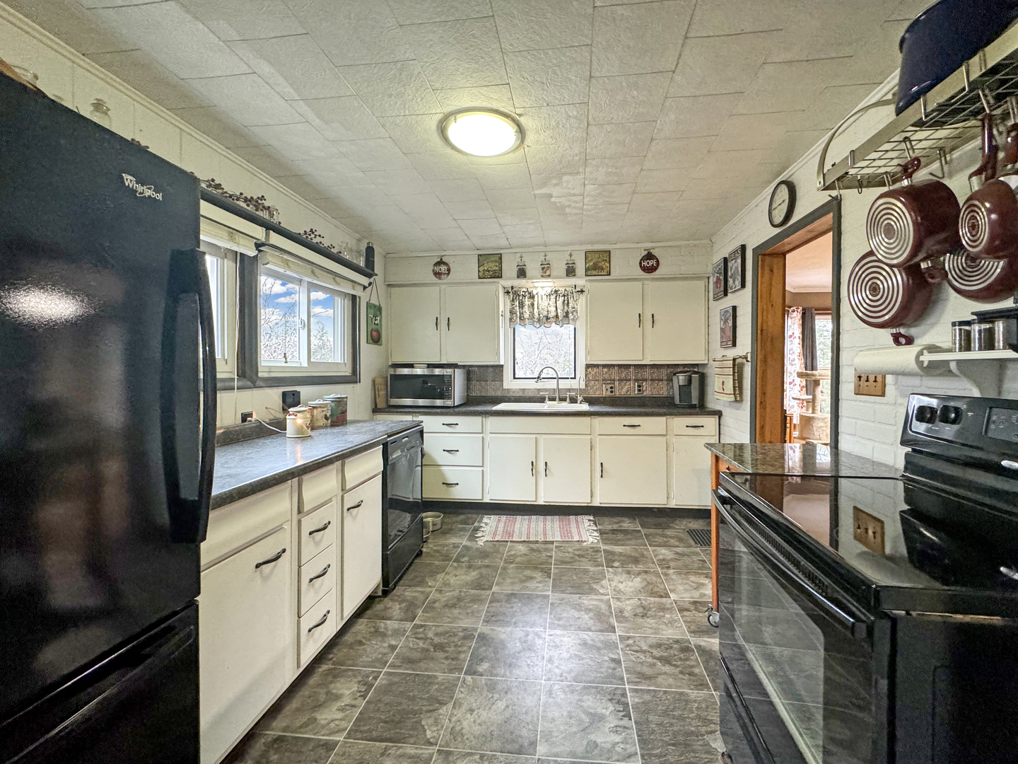2289 North AYP Road Freeport, IL 61032 - Photo 10 of 52 a large kitchen with stainless steel appliances granite countertop a stove and a sink