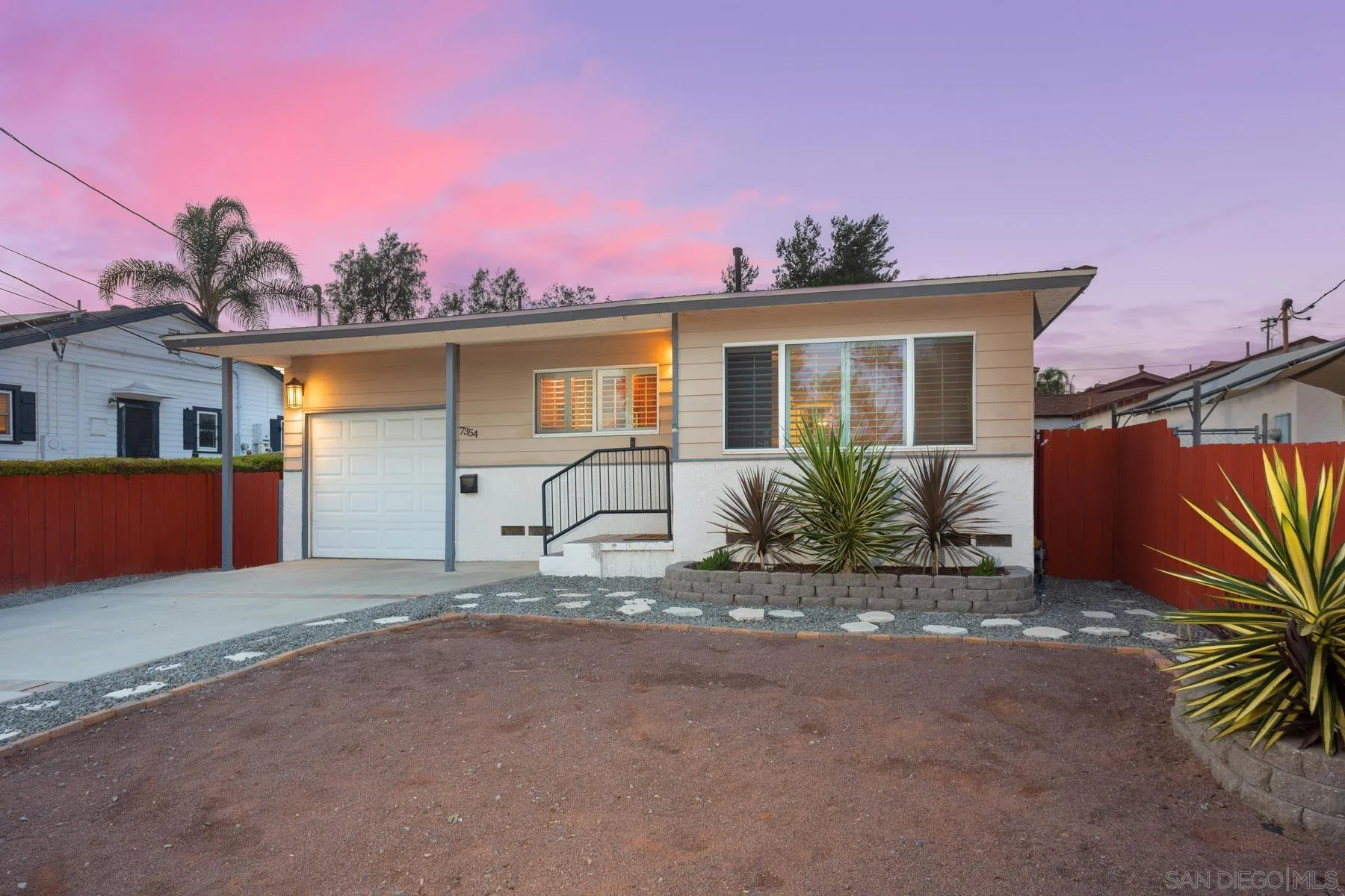 7354 Colony Road La Mesa, CA 91942 - Photo 2 of 24 a front view of a house with a yard