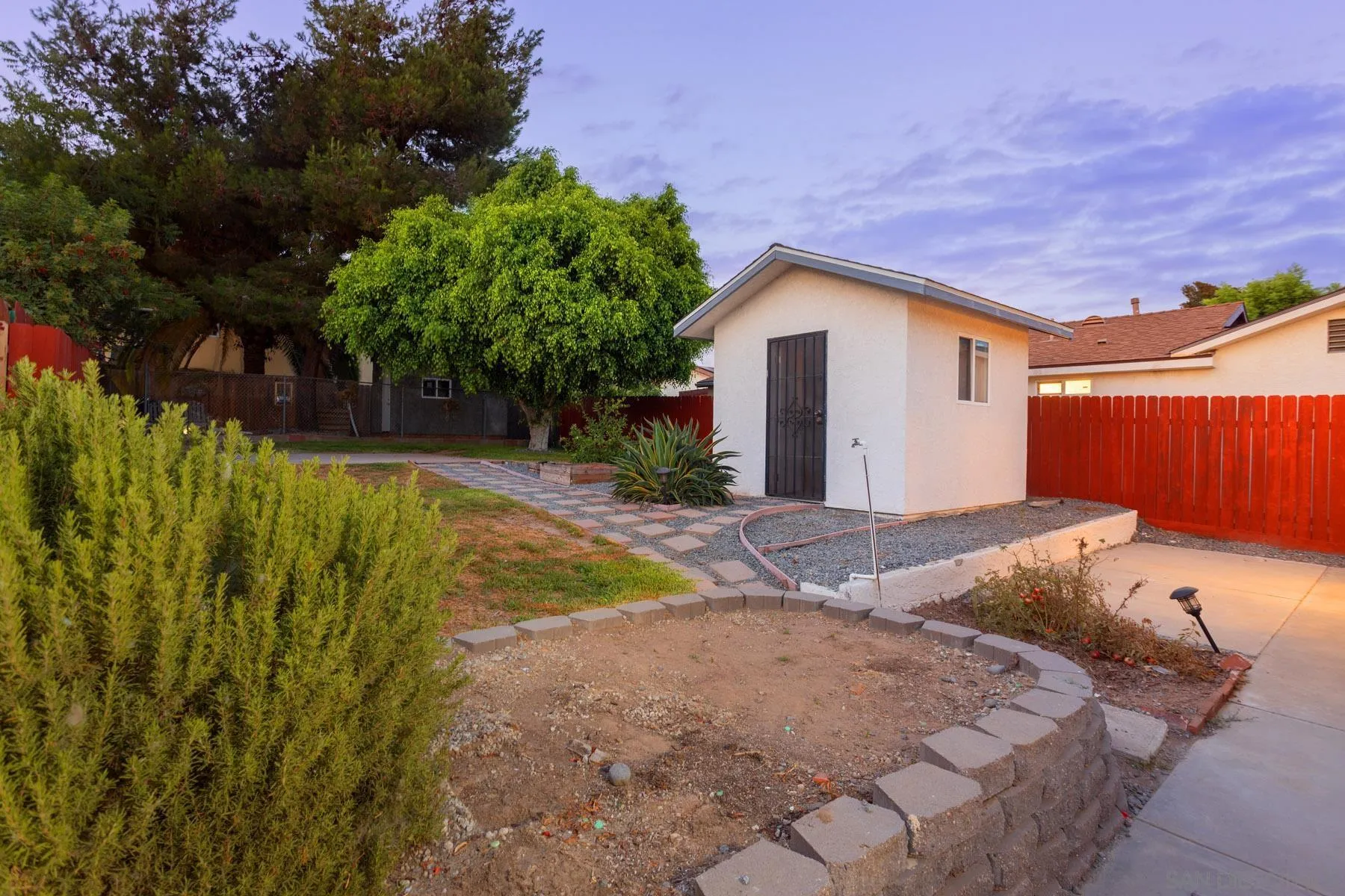 7354 Colony Road La Mesa, CA 91942 - Photo 5 of 24 a view of backyard with kitchen and outdoor space