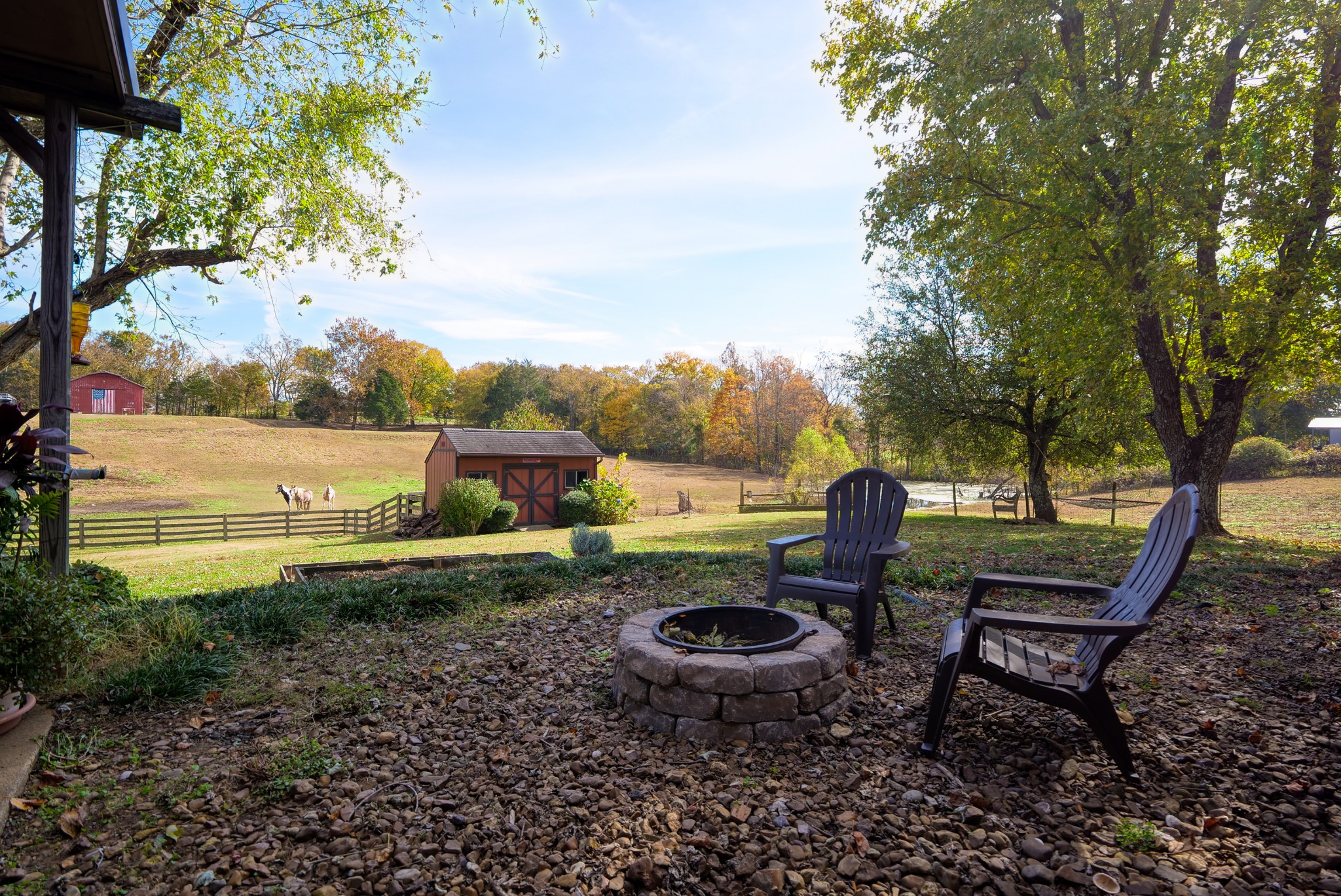 175 Bettis Road Lebanon, TN 37090 - Photo 27 of 49 a view of a backyard with table and chairs potted plants and large tree