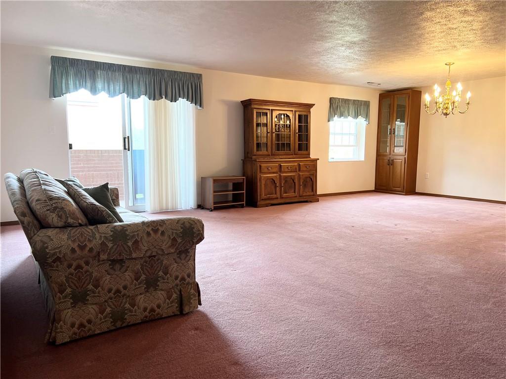 2850 Edgecliff Road, Unit 35 Lower Burrell, PA 15068 - Photo 5 of 27 View of living room and dining room