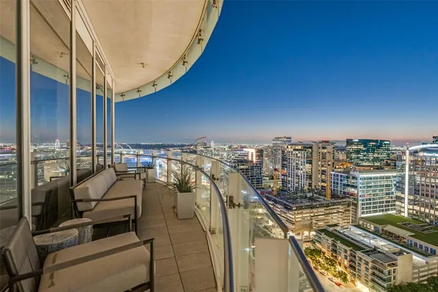 a view of balcony with furniture