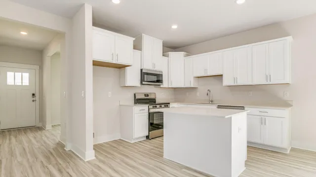 a picture of a bench in front of a wall