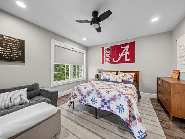 8294 North Leaf River Road Leaf River, IL 61047 - Photo 29 of 56 a bedroom with a bed and a chandelier