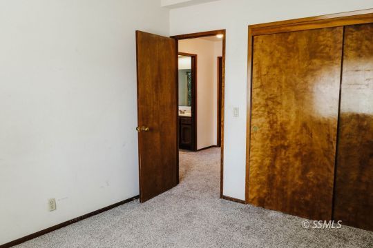 420 Veada Avenue Ridgecrest, CA 93555 - Photo 28 of 41 a view of a bathroom with sliding glass door