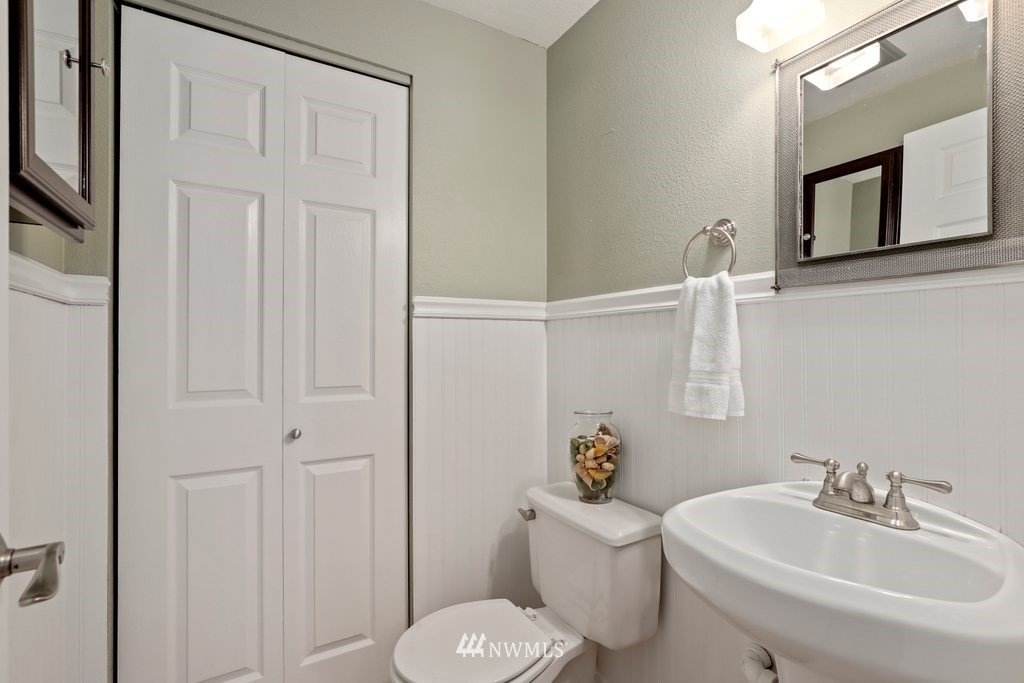 2102 186th Place Southeast Bothell, WA 98012 - Photo 16 of 31 a bathroom with a sink toilet and shower