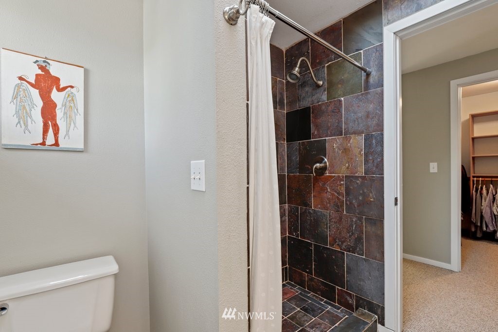 2102 186th Place Southeast Bothell, WA 98012 - Photo 20 of 31 a bathroom with a shower toilet and sink