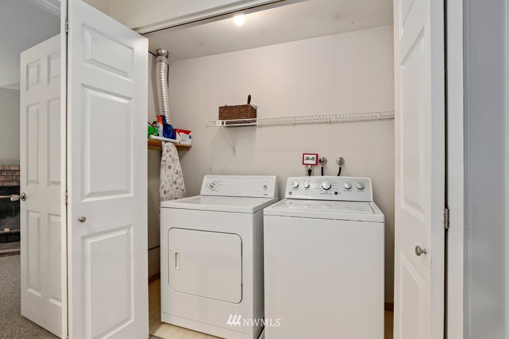 2102 186th Place Southeast Bothell, WA 98012 - Photo 26 of 31 a utility room with dryer and washer