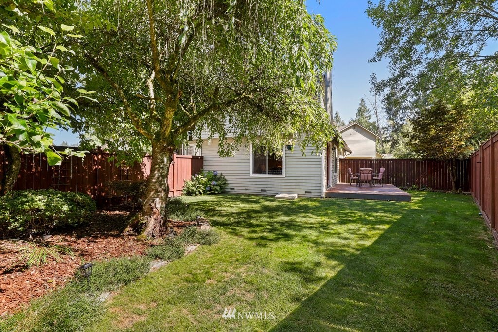 2102 186th Place Southeast Bothell, WA 98012 - Photo 30 of 31 a view of a house with a yard