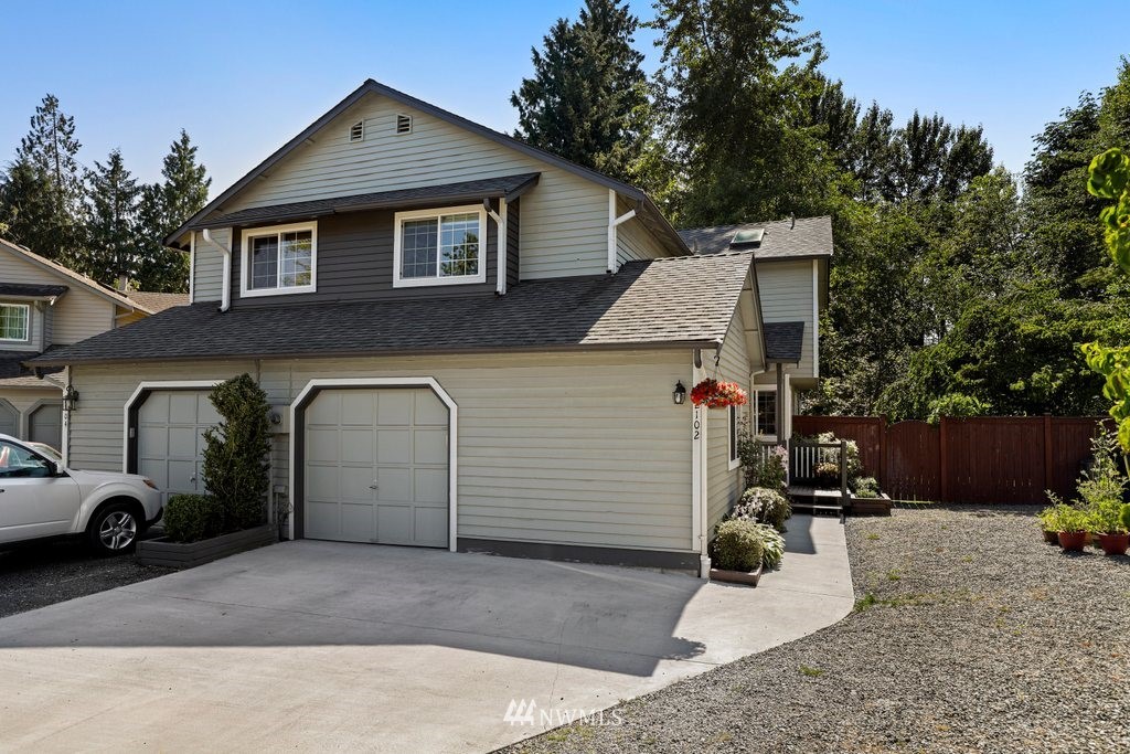 2102 186th Place Southeast Bothell, WA 98012 - Photo 31 of 31 a front view of a house with parking space