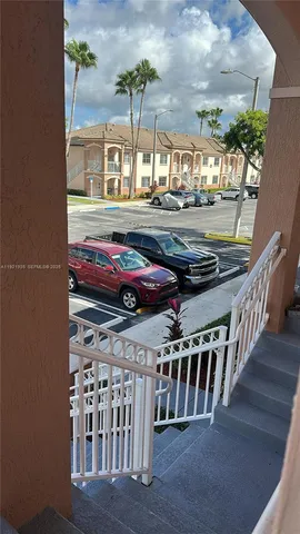 a front view of a house with wooden floor
