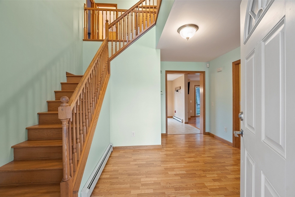 819 West Street Lunenburg, MA 01462 - Photo 21 of 42 a view of an entryway with wooden floor