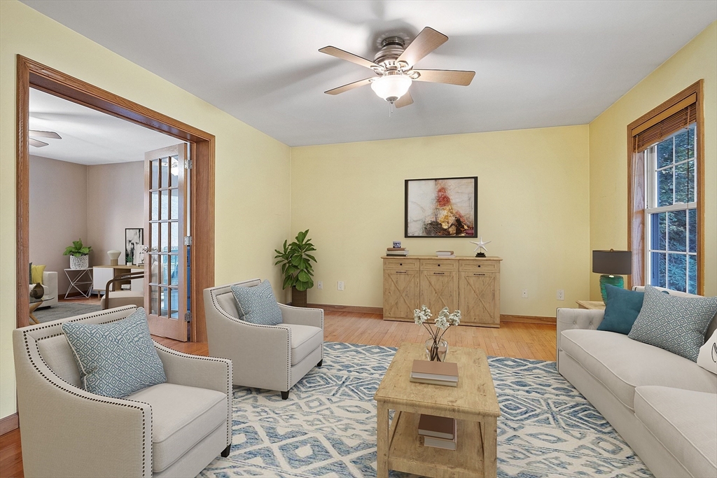 819 West Street Lunenburg, MA 01462 - Photo 28 of 42 a living room with furniture and a couch