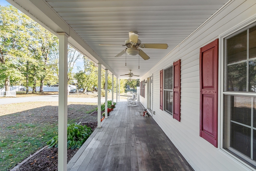 819 West Street Lunenburg, MA 01462 - Photo 3 of 42 a view of a porch with wooden floor and outdoor space