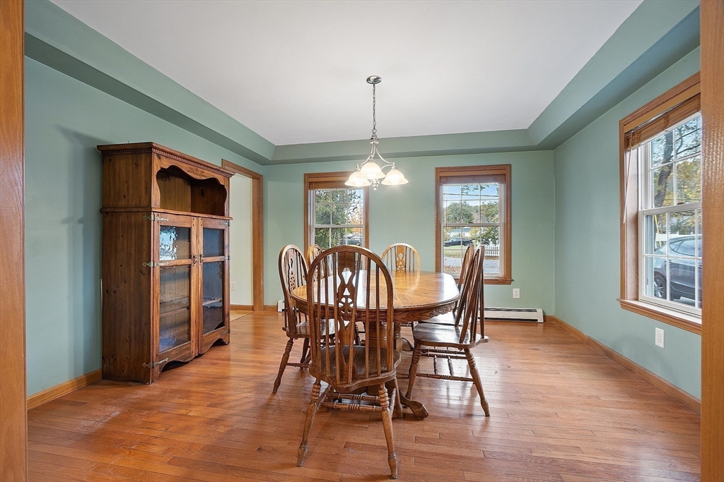 819 West Street Lunenburg, MA 01462 - Photo 33 of 42 a view of a dining room with furniture window and wooden floor