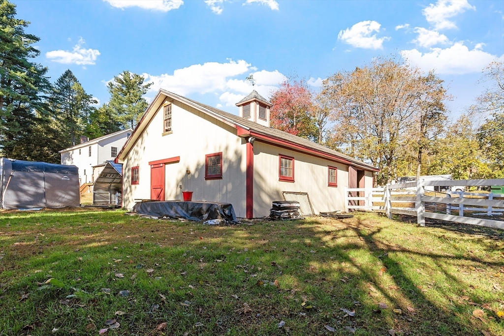 819 West Street Lunenburg, MA 01462 - Photo 10 of 42 a view of a house with a yard
