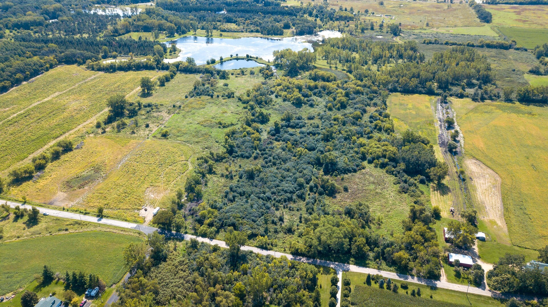 0 Green Road Harvard, IL 60033 - Photo 3 of 7 an aerial view of residential houses with outdoor space