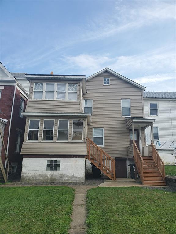 451-453 Philadelphia Street Indiana, PA 15701 - Photo 12 of 23 a front view of house with yard
