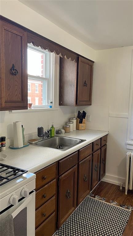 451-453 Philadelphia Street Indiana, PA 15701 - Photo 15 of 23 a kitchen with a sink stove and cabinets