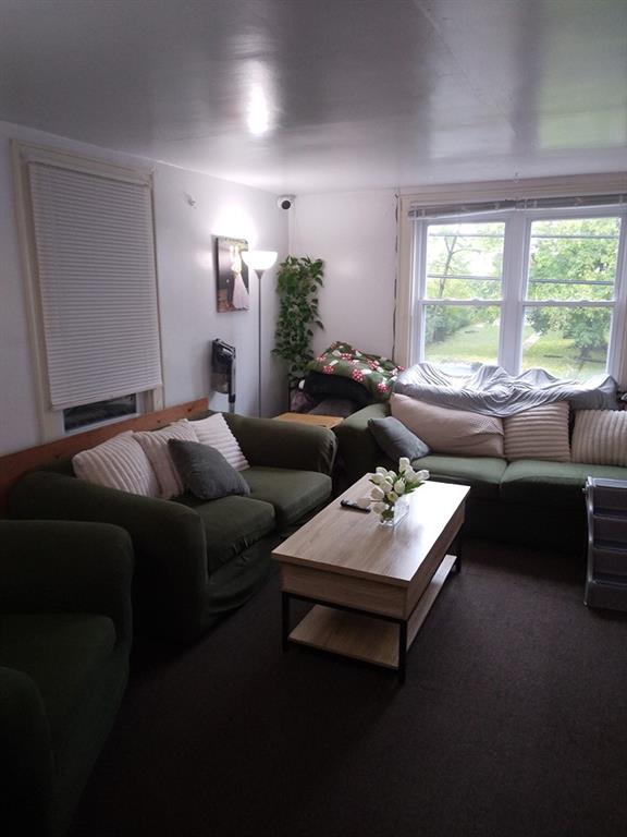 451-453 Philadelphia Street Indiana, PA 15701 - Photo 19 of 23 a living room with furniture and a large window