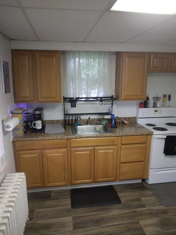 451-453 Philadelphia Street Indiana, PA 15701 - Photo 20 of 23 a kitchen with granite countertop a sink cabinets and stainless steel appliances