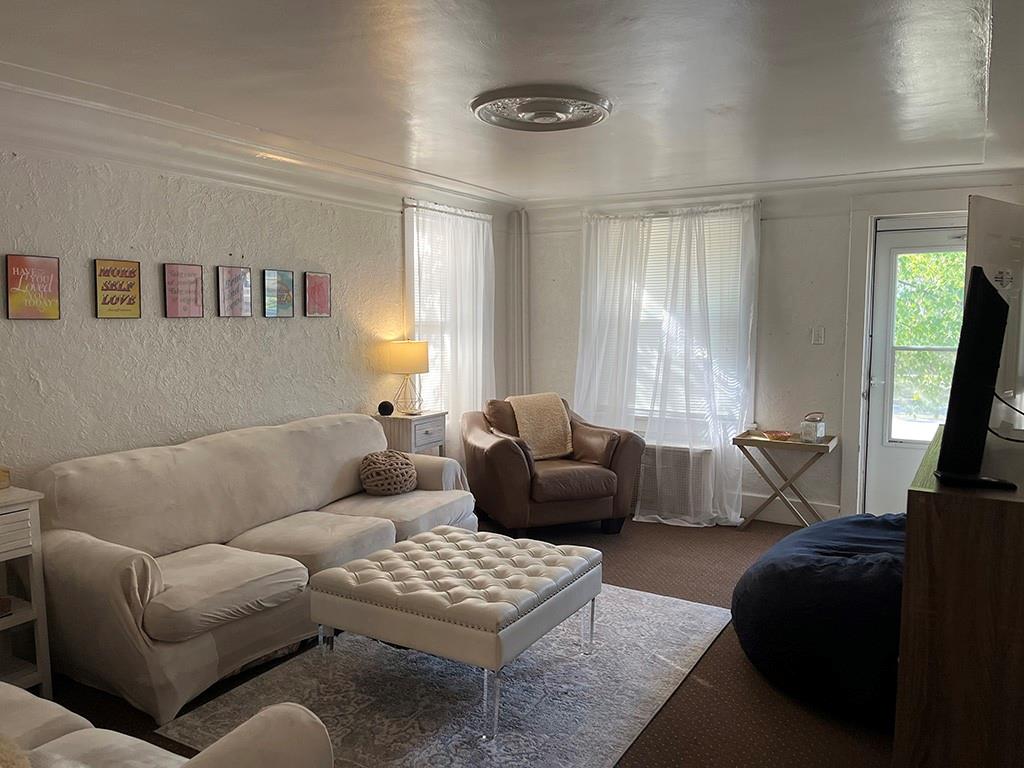 451-453 Philadelphia Street Indiana, PA 15701 - Photo 2 of 23 a living room with furniture and a window