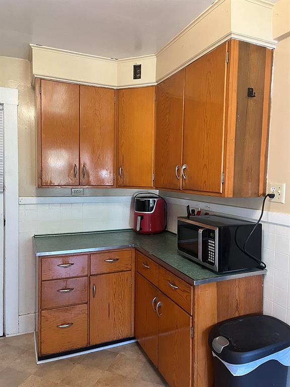 451-453 Philadelphia Street Indiana, PA 15701 - Photo 3 of 23 a kitchen with stainless steel appliances a cabinets and a dresser