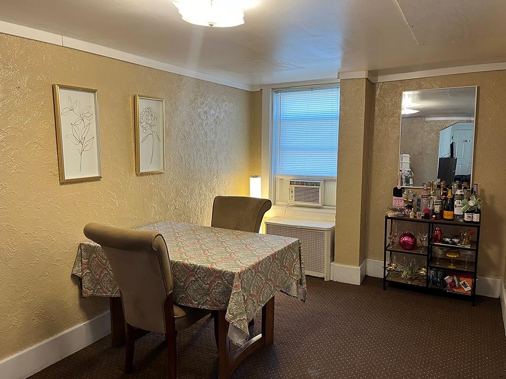 451-453 Philadelphia Street Indiana, PA 15701 - Photo 4 of 23 a bedroom with a bed and a table in it