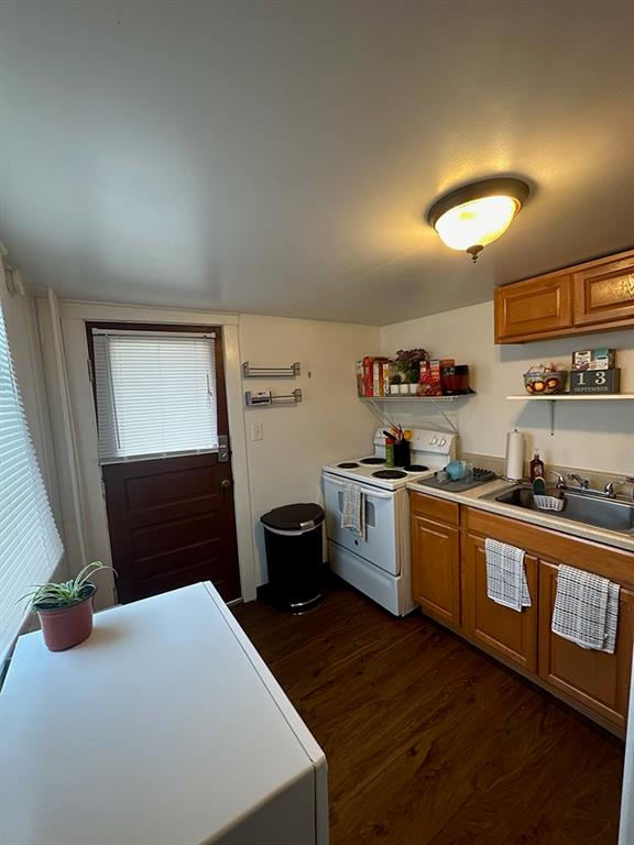 451-453 Philadelphia Street Indiana, PA 15701 - Photo 9 of 23 a kitchen with sink cabinets and stove top oven