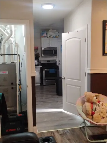 a bathroom with a bathtub and shower