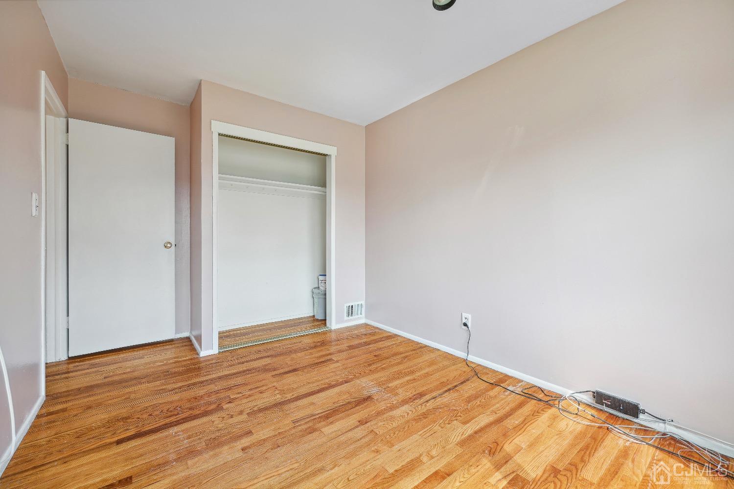 21 Rutgers Road Old Bridge, NJ 08859 - Photo 15 of 27 a view of empty room with wooden floor