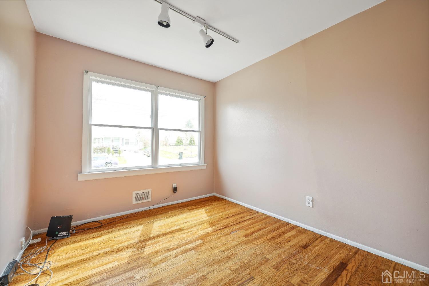 21 Rutgers Road Old Bridge, NJ 08859 - Photo 16 of 27 a view of an empty room with a window