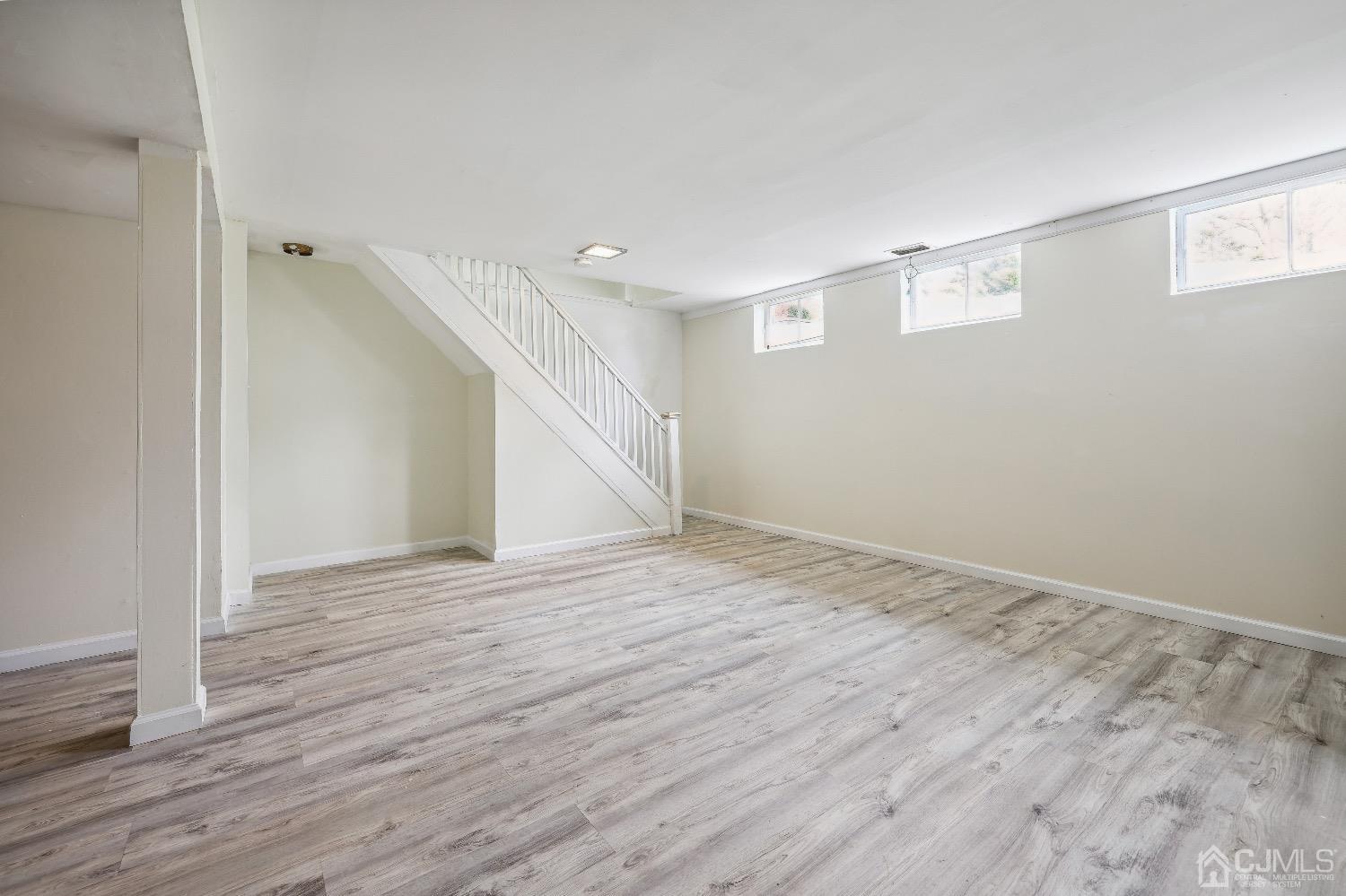 21 Rutgers Road Old Bridge, NJ 08859 - Photo 20 of 27 a view of an empty room with wooden floor