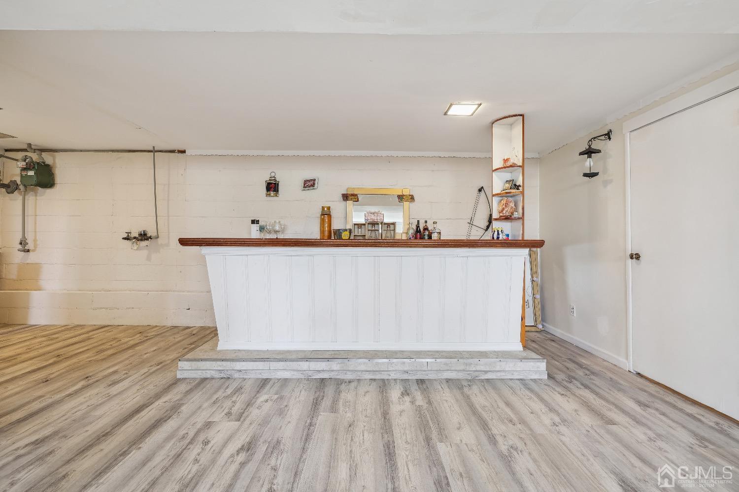 21 Rutgers Road Old Bridge, NJ 08859 - Photo 21 of 27 a view of a kitchen with wooden floor and cabinets