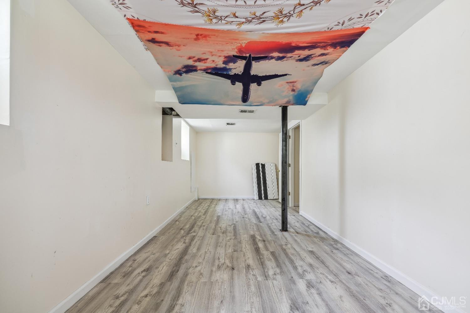 21 Rutgers Road Old Bridge, NJ 08859 - Photo 24 of 27 a view of a room with wooden floor