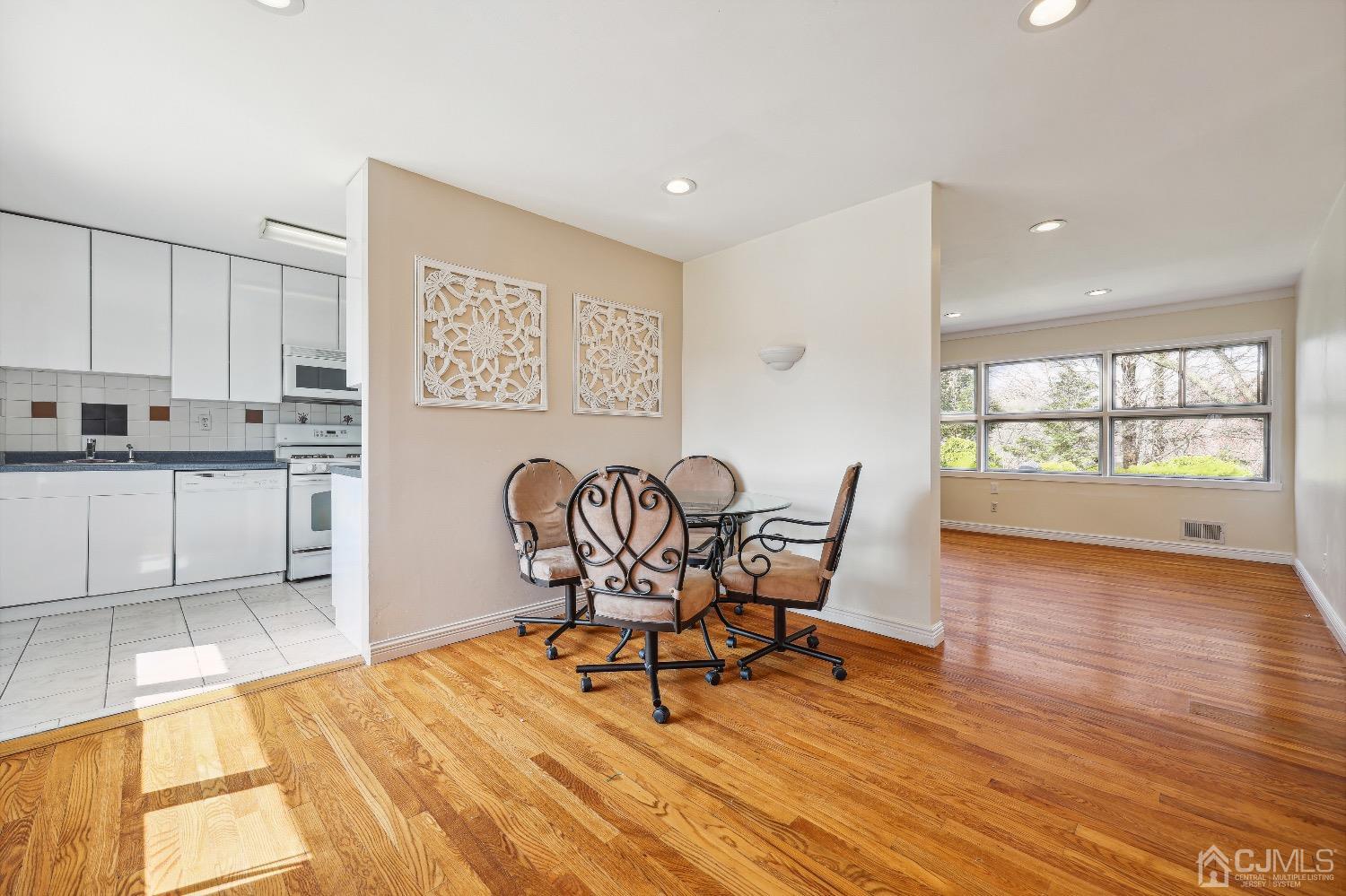 21 Rutgers Road Old Bridge, NJ 08859 - Photo 4 of 27 a dining room with furniture and wooden floor
