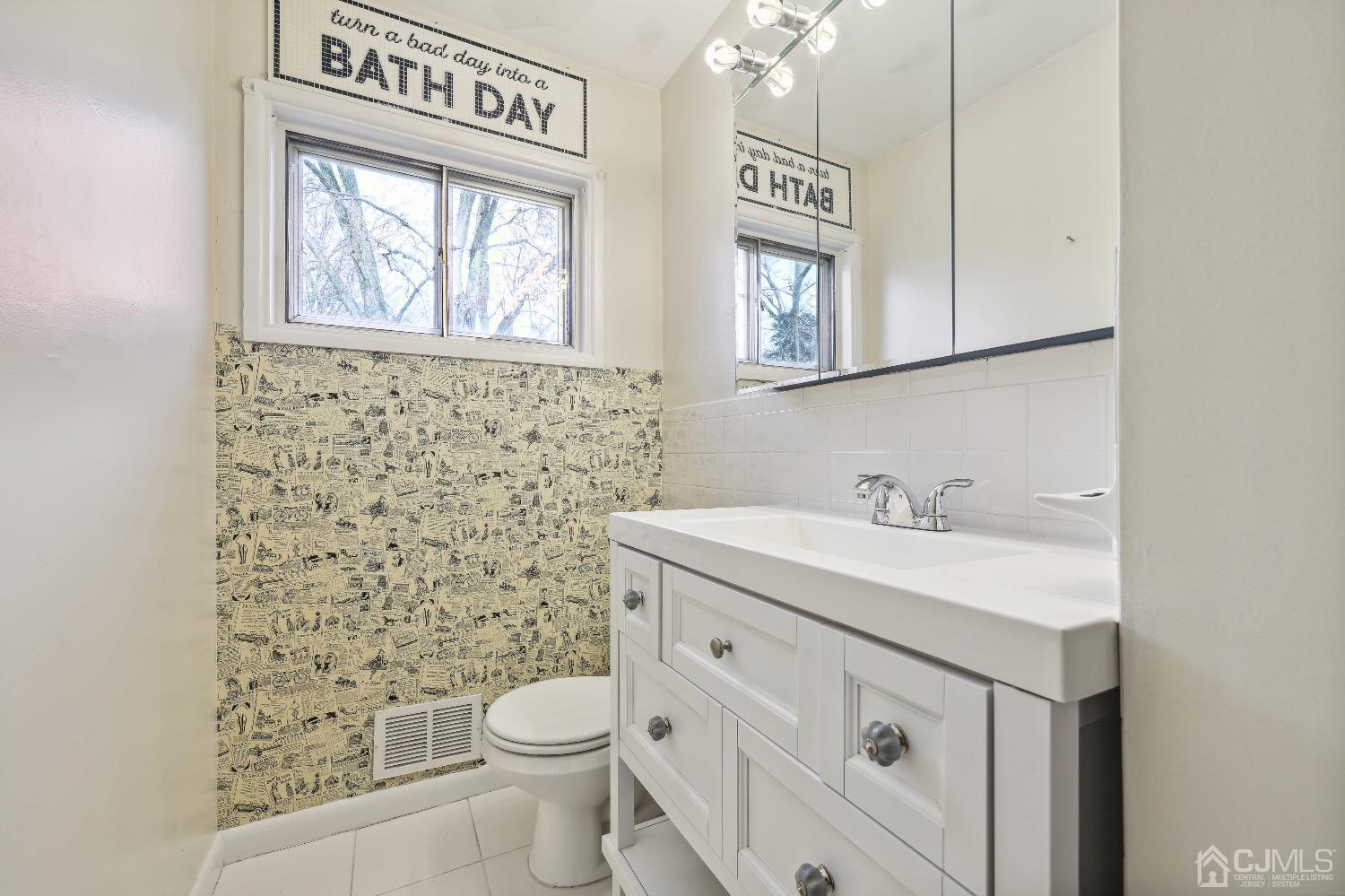 21 Rutgers Road Old Bridge, NJ 08859 - Photo 9 of 27 a bathroom with a granite countertop toilet sink and mirror