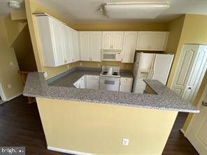 538 Rhapsody Court, Unit 538 Cockeysville, MD 21030 - Photo 13 of 30 Bright and inviting kitchen space.