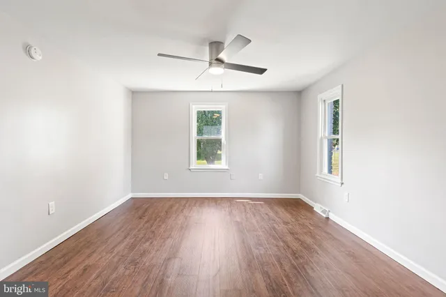 a view of an empty walk in closet